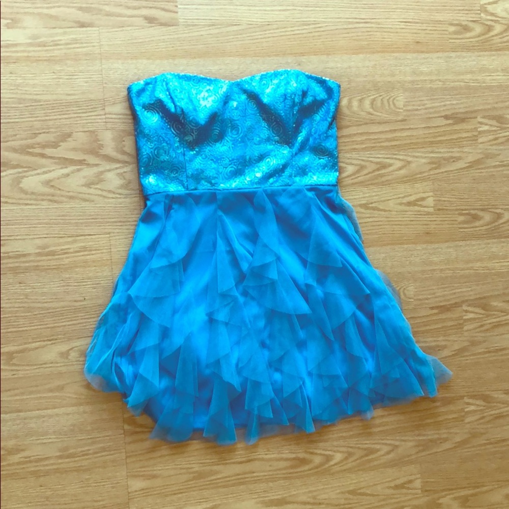 A beautiful blue sequence strapless event dress